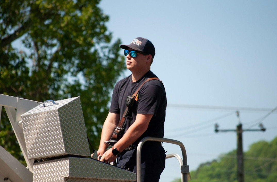 Signal engineer checking broadcast transmission equipment racks
