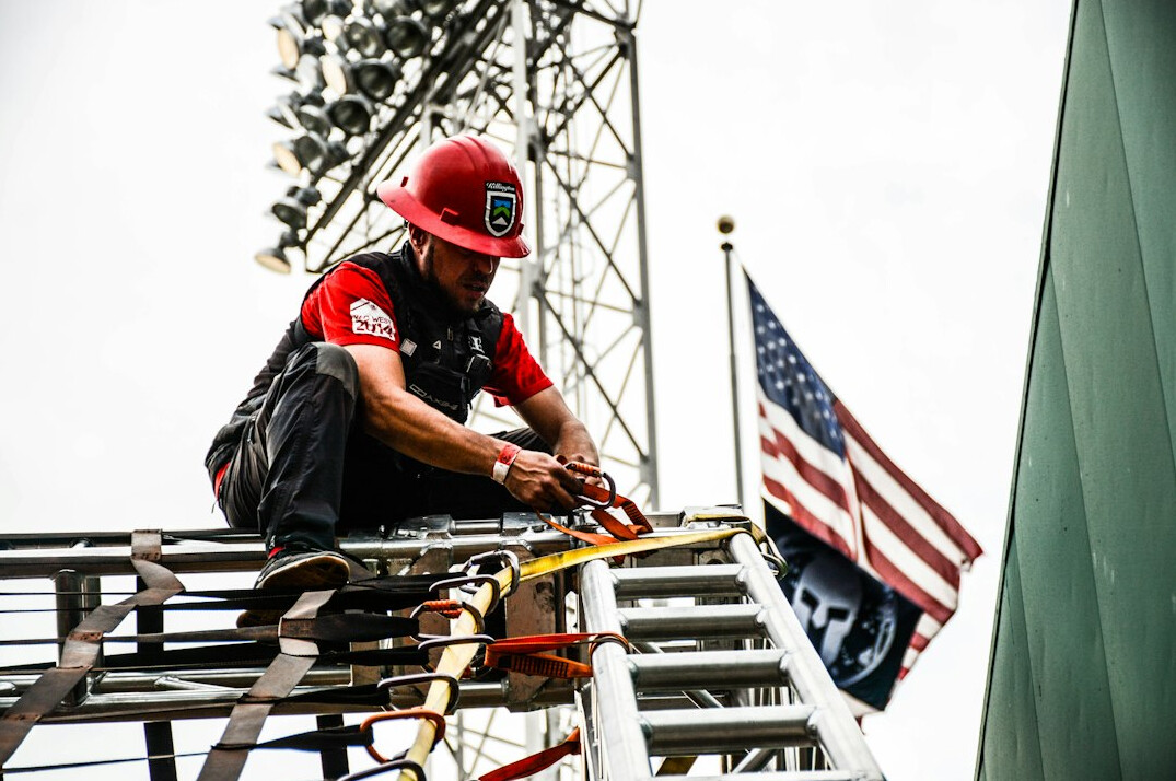 Engineer monitoring live signal strength on broadcast equipment