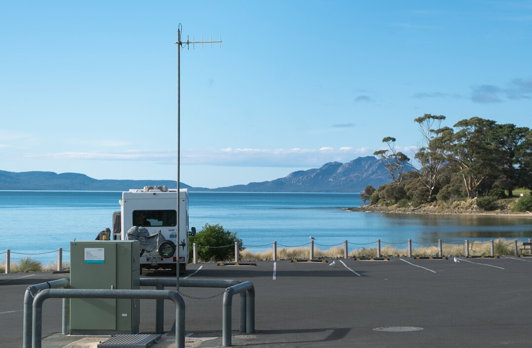 Satellite uplink broadcast van parked outside a television studio